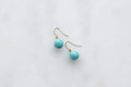 Boho earrings with turquoise globe and 14k gold hooks